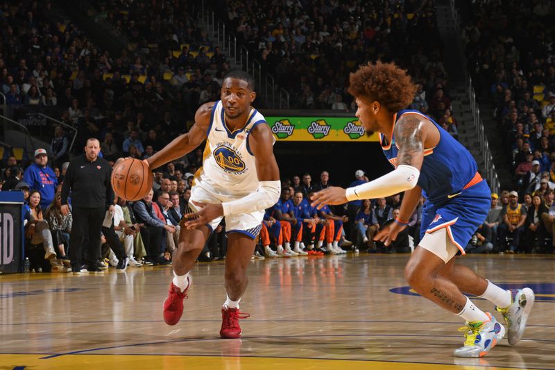 SAN FRANCISCO, CA - MARCH 18: Jonathan Kuminga #00 of the Golden State Warriors dribbles the ball during the game against the New York Knicks on MARCH 18, 2024 at Chase Center in San Francisco, California. NOTE TO USER: User expressly acknowledges and agrees that, by downloading and or using this photograph, user is consenting to the terms and conditions of Getty Images License Agreement. Mandatory Copyright Notice: Copyright 2024 NBAE (Photo by Noah Graham/NBAE via Getty Images)