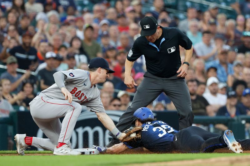 Aug 30, 2024; Detroit, Michigan, USA; Detroit Tigers shortstop Zach McKinstry (39) is tagged out at third by Boston Red Sox Nick Sogard (75) in the fifth inning at Comerica Park. Mandatory Credit: Rick Osentoski-USA TODAY Sports