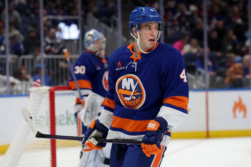 Jan 28, 2025; Elmont, New York, USA; New York Islanders defenseman Tony DeAngelo (4) skates against the Colorado Avalanche during the third period at UBS Arena. Mandatory Credit: Brad Penner-Imagn Images