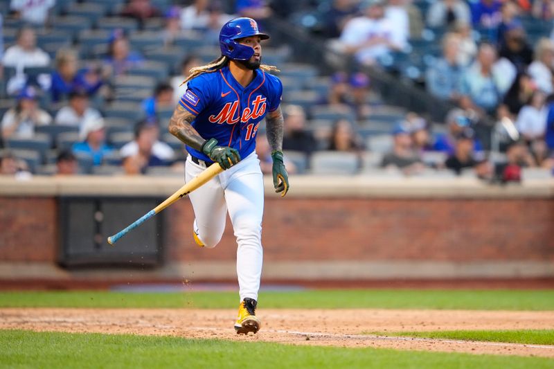 Sep 14, 2023; New York City, New York, USA; New York Mets third baseman Jonathan Arauz (19) watches his three run home run against the Arizona Diamondbacks during the eighth inning at Citi Field. Mandatory Credit: Gregory Fisher-USA TODAY Sports