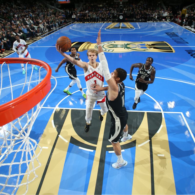 MILWAUKEE, WI - NOVEMBER 12:  Gradey Dick #1 of the Toronto Raptors shoots the ball during the game against the Milwaukee Bucks during the Emirates NBA Cup game on November 12, 2024 at Fiserv Forum Center in Milwaukee, Wisconsin. NOTE TO USER: User expressly acknowledges and agrees that, by downloading and or using this Photograph, user is consenting to the terms and conditions of the Getty Images License Agreement. Mandatory Copyright Notice: Copyright 2024 NBAE (Photo by Gary Dineen/NBAE via Getty Images).