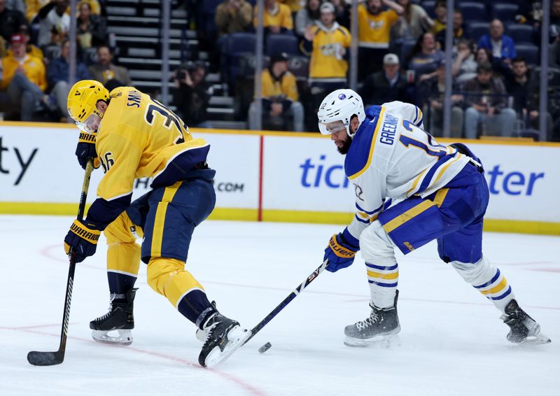 Mar 7, 2024; Nashville, Tennessee, USA; Buffalo Sabres left wing Jordan Greenway (12) stops an attack by Nashville Predators left wing Cole Smith (36) during their game at Bridgestone Arena. Mandatory Credit: Alan Poizner-USA TODAY Sports