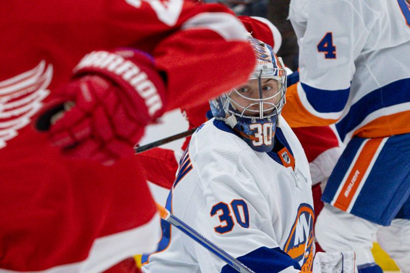 Oct 30, 2023; Elmont, New York, USA; New York Islanders goaltender Ilya Sorokin (30) tracks the puck against the Detroit Red Wings during the first period at UBS Arena. Mandatory Credit: Thomas Salus-USA TODAY Sports