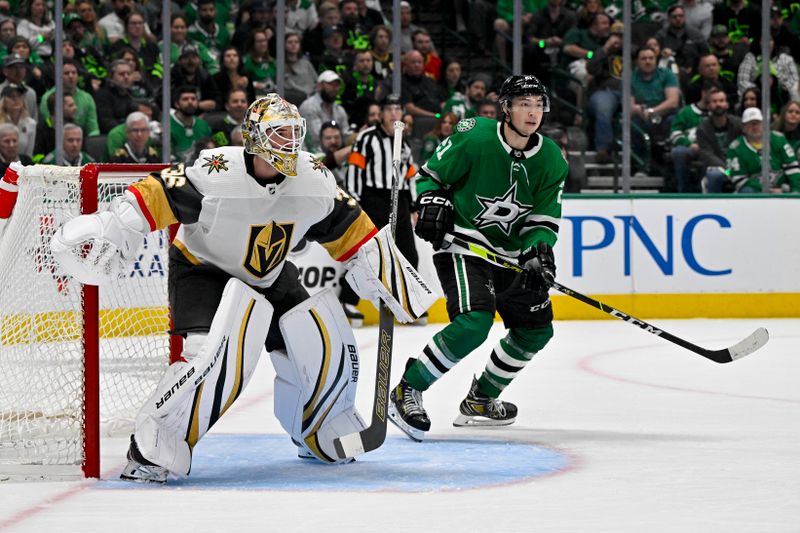 Apr 24, 2024; Dallas, Texas, USA; Dallas Stars left wing Jason Robertson (21) looks for the puck in front of Vegas Golden Knights goaltender Logan Thompson (36) during the second period in game two of the first round of the 2024 Stanley Cup Playoffs at American Airlines Center. Mandatory Credit: Jerome Miron-USA TODAY Sports