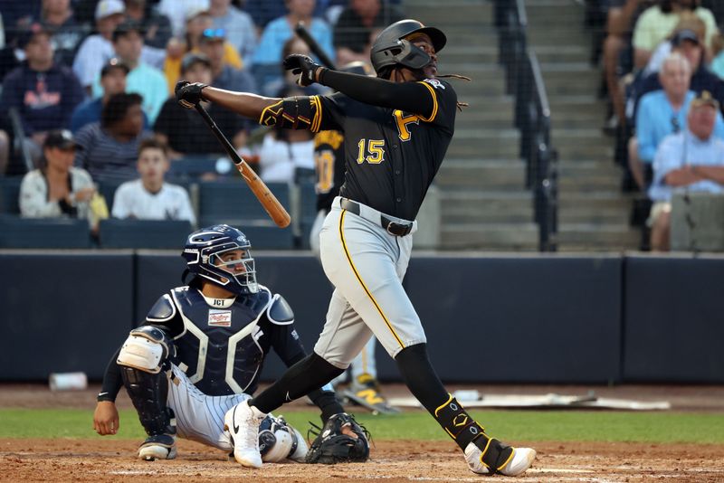 Mar 20, 2024; Tampa, Florida, USA; Pittsburgh Pirates shortstop Oneil Cruz (15) doubles during the third inning against the New York Yankees at George M. Steinbrenner Field. Mandatory Credit: Kim Klement Neitzel-USA TODAY Sports