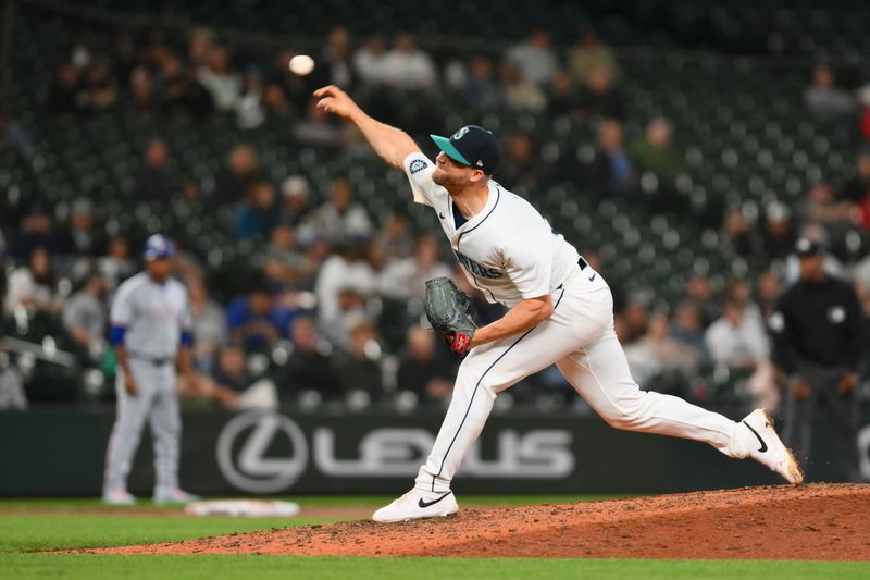 Sep 12, 2024; Seattle, Washington, USA; Seattle Mariners relief pitcher Austin Voth (30) pitches to the Texas Rangers during the ninth inning at T-Mobile Park. Mandatory Credit: Steven Bisig-Imagn Images