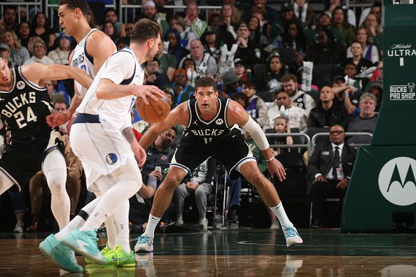 MILWAUKEE, WI - NOVEMBER 18: Brook Lopez #11 of the Milwaukee Bucks plays defense against the Dallas Mavericks on November 18, 2023 at the Fiserv Forum Center in Milwaukee, Wisconsin. NOTE TO USER: User expressly acknowledges and agrees that, by downloading and or using this Photograph, user is consenting to the terms and conditions of the Getty Images License Agreement. Mandatory Copyright Notice: Copyright 2023 NBAE (Photo by Gary Dineen/NBAE via Getty Images).