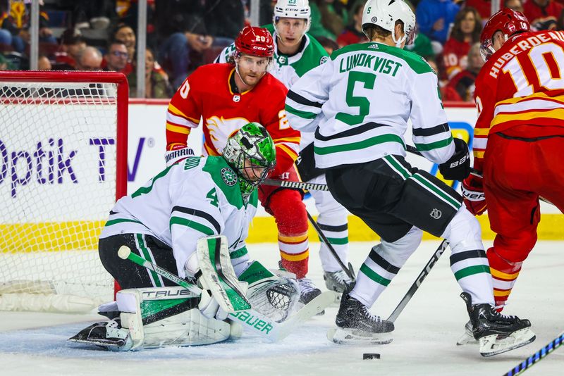 Nov 30, 2023; Calgary, Alberta, CAN; Dallas Stars goaltender Scott Wedgewood (41) makes a save against the Calgary Flames during the second period at Scotiabank Saddledome. Mandatory Credit: Sergei Belski-USA TODAY Sports