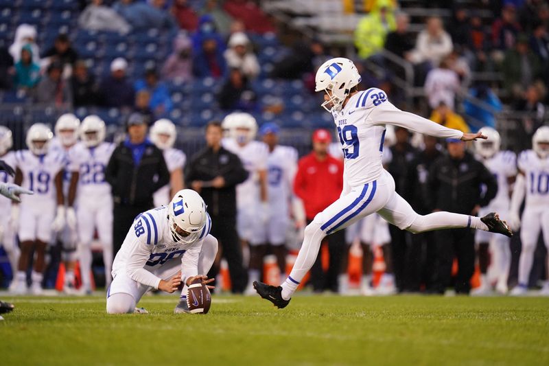 Sep 23, 2023; East Hartford, Connecticut, USA; Duke Blue Devils place kicker Todd Pelino (29) kicks for a field goal against the UConn Huskies in the second half at Rentschler Field at Pratt & Whitney Stadium. Mandatory Credit: David Butler II-USA TODAY Sports