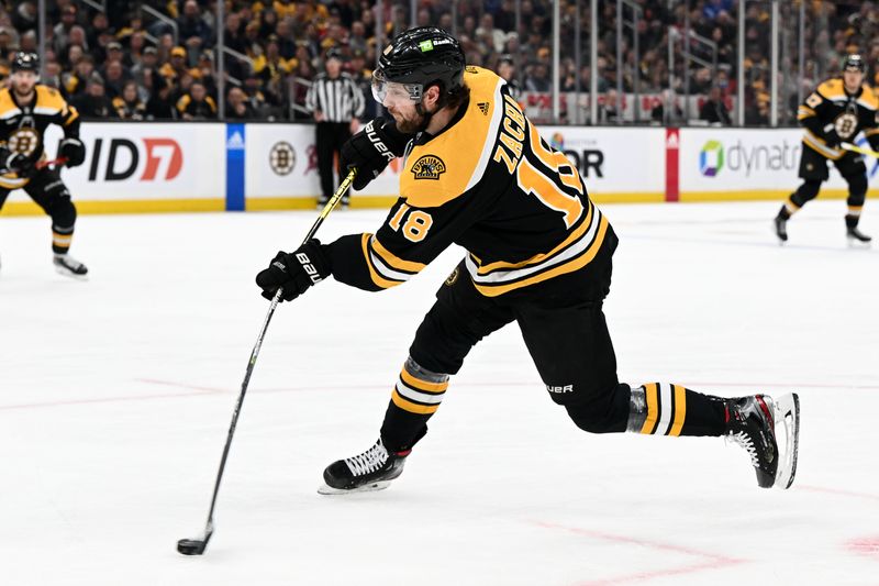 Mar 9, 2023; Boston, Massachusetts, USA; Boston Bruins center Pavel Zacha (18) takes a shot on goal against the Edmonton Oilers during the first period at the TD Garden. Mandatory Credit: Brian Fluharty-USA TODAY Sports