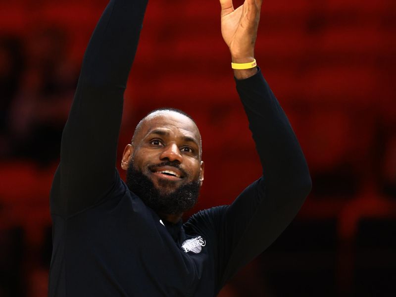 MIAMI, FLORIDA - DECEMBER 04: LeBron James #23 of the Los Angeles Lakers warms up prior to facing the Miami Heat during the first half at Kaseya Center on December 04, 2024 in Miami, Florida.  NOTE TO USER: User expressly acknowledges and agrees that, by downloading and or using this Photograph, user is consenting to the terms and conditions of the Getty Images License Agreement. (Photo by Carmen Mandato/Getty Images)