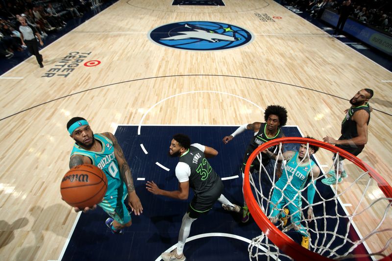 MINNEAPOLIS, MN -  JANUARY 22: Miles Bridges #0 of the Charlotte Hornets drives to the basket during the game against the Minnesota Timberwolves on January 22, 2024 at Target Center in Minneapolis, Minnesota. NOTE TO USER: User expressly acknowledges and agrees that, by downloading and or using this Photograph, user is consenting to the terms and conditions of the Getty Images License Agreement. Mandatory Copyright Notice: Copyright 2024 NBAE (Photo by Jordan Johnson/NBAE via Getty Images)