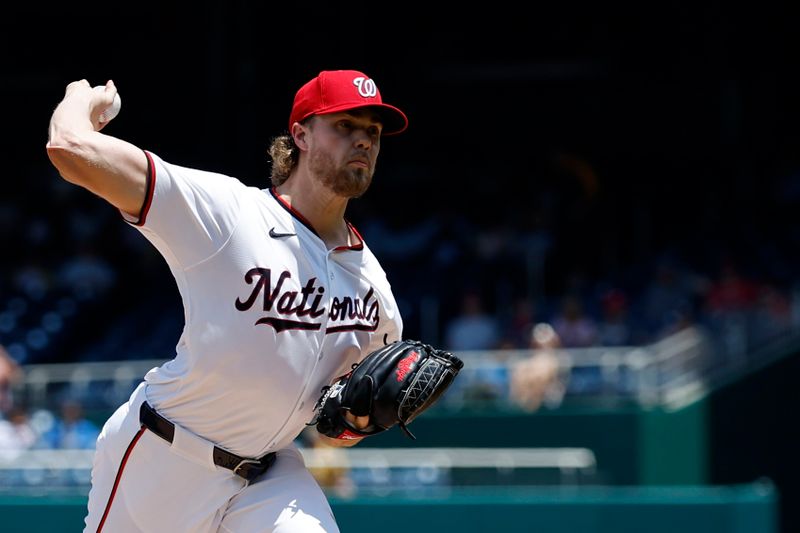 May 22, 2024; Washington, District of Columbia, USA; Washington Nationals pitcher Jake Irvin (27) pitches against the Minnesota Twins during the first inning at Nationals Park. Mandatory Credit: Geoff Burke-USA TODAY Sports