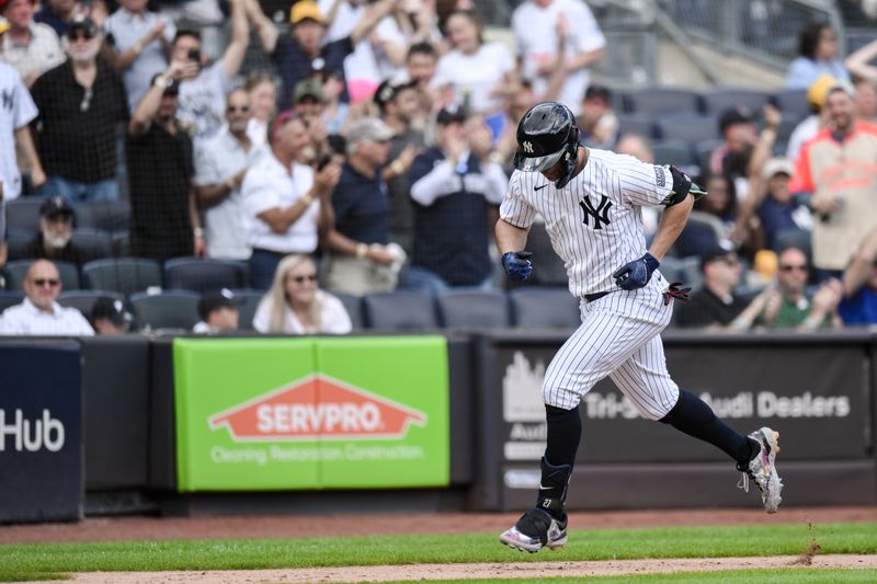 Aug 22, 2024; Bronx, New York, USA; New York Yankees designated hitter Giancarlo Stanton (27) rounds the bases after hitting a three run home runagainst the Cleveland Guardians during the fifth inning at Yankee Stadium. Mandatory Credit: John Jones-USA TODAY Sports