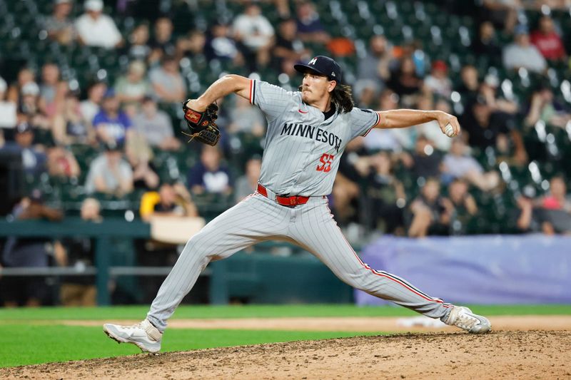 Jul 8, 2024; Chicago, Illinois, USA; Minnesota Twins relief pitcher Kody Funderburk (55) delivers a pitch against the Chicago White Sox during the 11th inning at Guaranteed Rate Field. Mandatory Credit: Kamil Krzaczynski-USA TODAY Sports