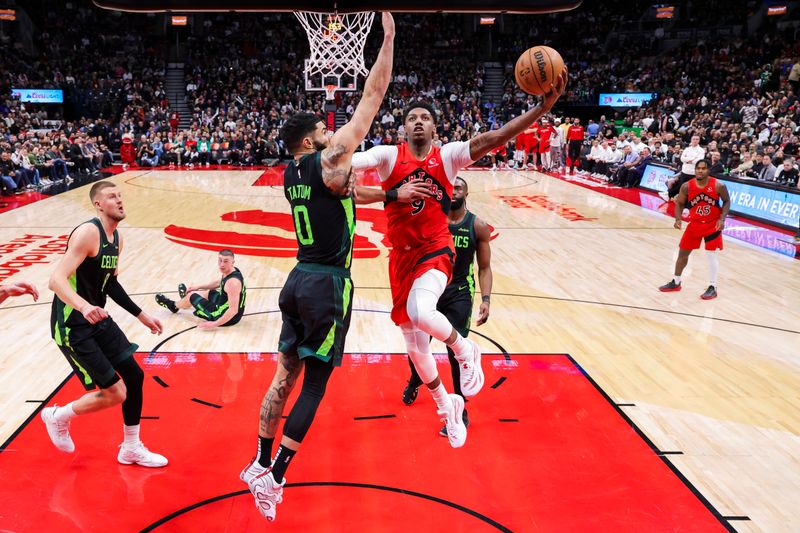 TORONTO, CANADA - JANUARY 15: RJ Barrett #9 of the Toronto Raptors drives to the basket during the game against the Boston Celtics on January 15, 2025 at the Scotiabank Arena in Toronto, Ontario, Canada.  NOTE TO USER: User expressly acknowledges and agrees that, by downloading and or using this Photograph, user is consenting to the terms and conditions of the Getty Images License Agreement.  Mandatory Copyright Notice: Copyright 2025 NBAE (Photo by Vaughn Ridley/NBAE via Getty Images)