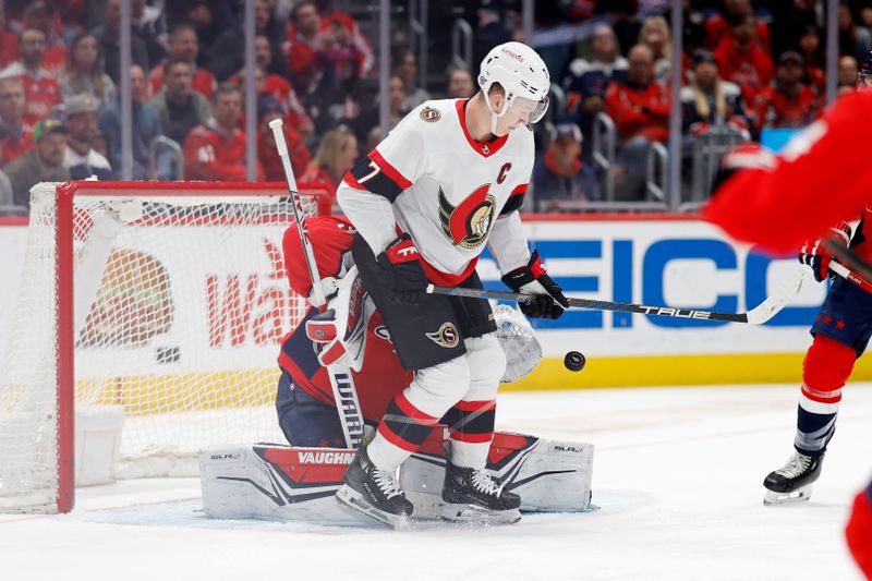 Feb 26, 2024; Washington, District of Columbia, USA; Washington Capitals goaltender Darcy Kuemper (35) makes a save on a deflection by Ottawa Senators left wing Brady Tkachuk (7) in the second period at Capital One Arena. Mandatory Credit: Geoff Burke-USA TODAY Sports