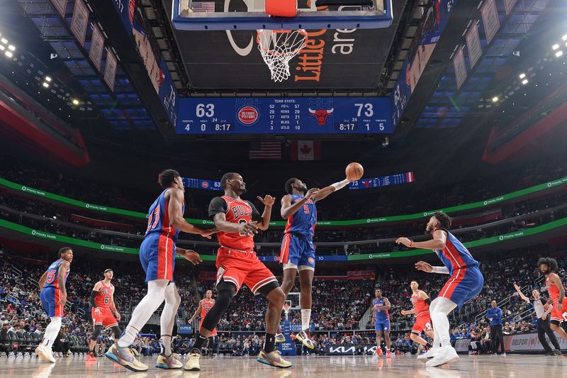 DETROIT, MI - APRIL 11: Chimezie Metu #5 of the Detroit Pistons grabs a rebound during the game against the Chicago Bulls on April 11, 2024 at Little Caesars Arena in Detroit, Michigan. NOTE TO USER: User expressly acknowledges and agrees that, by downloading and/or using this photograph, User is consenting to the terms and conditions of the Getty Images License Agreement. Mandatory Copyright Notice: Copyright 2024 NBAE (Photo by Chris Schwegler/NBAE via Getty Images)