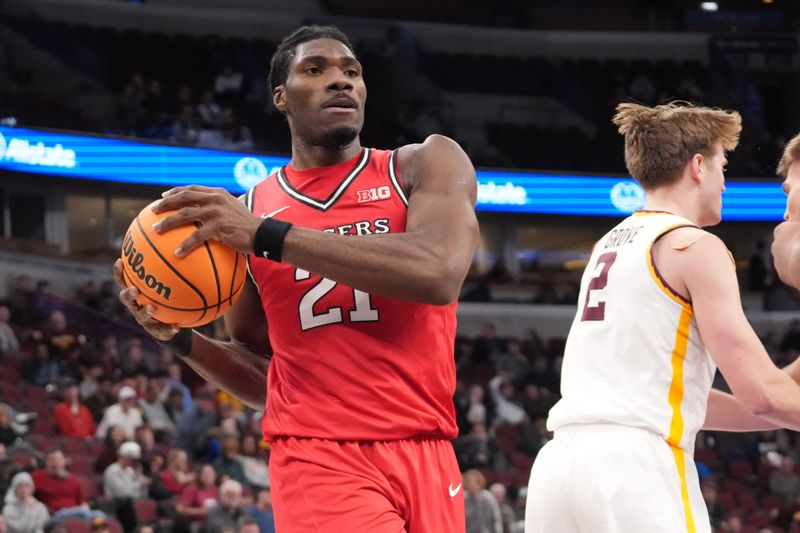 Mar 11, 2026; Chicago, IL, USA; Rutgers Scarlet Knights center Emmanuel Ogbole (21) grabs a rebound against the Minnesota Golden Gophers during the first half at United Center. Mandatory Credit: David Banks-Imagn Images