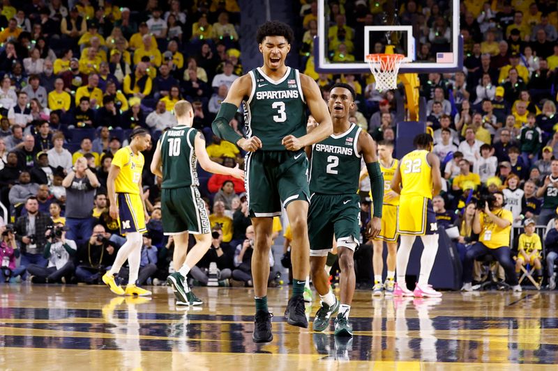 Feb 18, 2023; Ann Arbor, Michigan, USA;  Michigan State Spartans guard Jaden Akins (3) celebrates during the first half against the Michigan Wolverines at Crisler Center. Mandatory Credit: Rick Osentoski-USA TODAY Sports