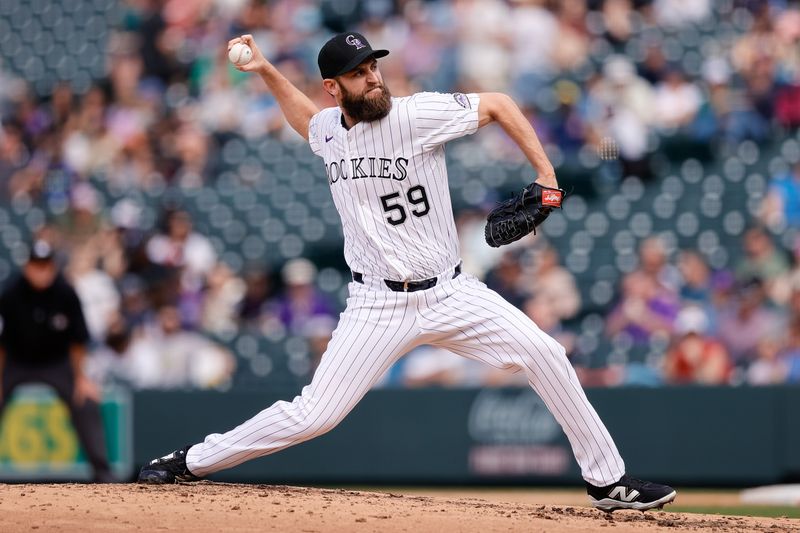 Apr 30, 2025; Denver, Colorado, USA; Colorado Rockies relief pitcher Jake Bird (59) pitches in the sixth inning against the Atlanta Braves at Coors Field. Mandatory Credit: Isaiah J. Downing-Imagn Images