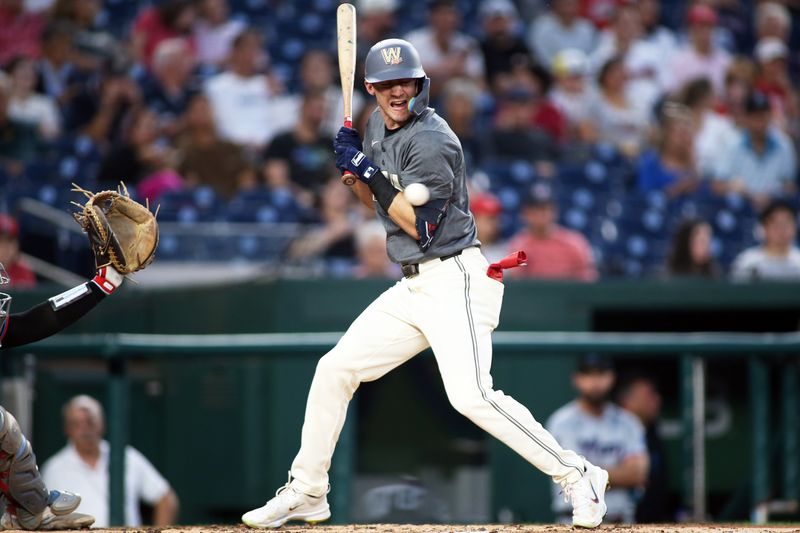 Sep 13, 2024; Washington, District of Columbia, USA; Washington Nationals outfielder Jacob Young (30) gets hit by a pitch during the second inning of a baseball game against the Miami Marlins, at Nationals Park. Mandatory Credit: Daniel Kucin Jr.-Imagn Images

