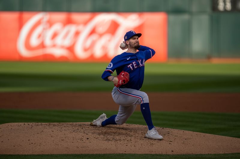 May 6, 2024; Oakland, California, USA; Texas Rangers starting pitcher Andrew Heaney (44) delivers a pitch against the Oakland Athletics during the first inning at Oakland-Alameda County Coliseum. Mandatory Credit: Neville E. Guard-USA TODAY Sports