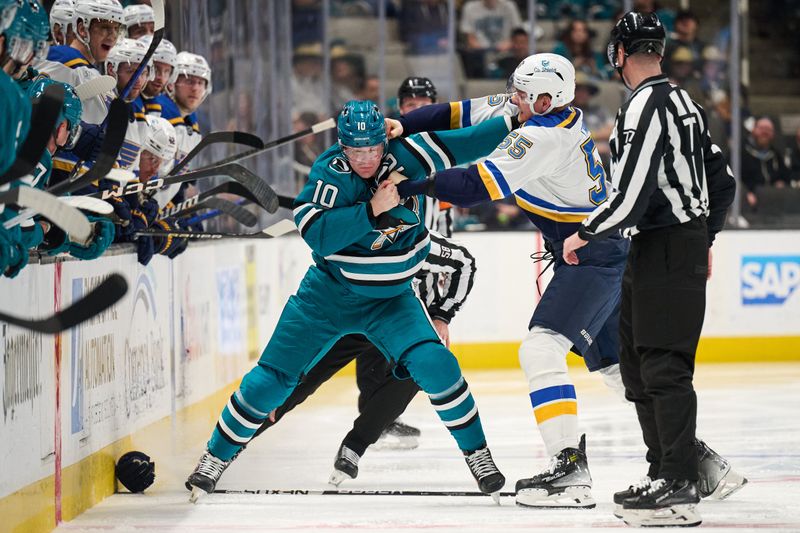 Apr 6, 2024; San Jose, California, USA; San Jose Sharks center Klim Kostin (10) fights St. Louis Blues defenseman Colton Parayko (55) during the third period at SAP Center at San Jose. Mandatory Credit: Robert Edwards-USA TODAY Sports