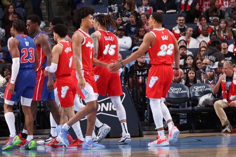 MEMPHIS, TN - NOVEMBER 27: Jaylen Wells #0 and Desmond Bane #22 of the Memphis Grizzlies high five during the game against the Detroit Pistons on November 27, 2024 at FedExForum in Memphis, Tennessee. NOTE TO USER: User expressly acknowledges and agrees that, by downloading and or using this photograph, User is consenting to the terms and conditions of the Getty Images License Agreement. Mandatory Copyright Notice: Copyright 2024 NBAE (Photo by Joe Murphy/NBAE via Getty Images)