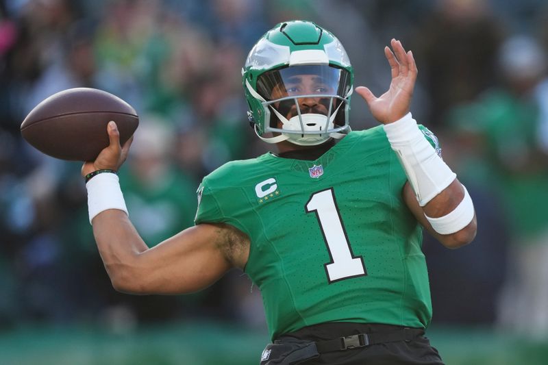 Philadelphia Eagles quarterback Jalen Hurts warms up before an NFL football game against the Jacksonville Jaguars on Sunday, Nov. 3, 2024, in Philadelphia. (AP Photo/Matt Slocum)