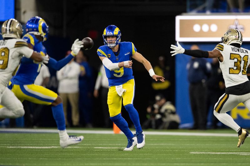 Los Angeles Rams quarterback Matthew Stafford (9) throws a pass during an NFL football game against the New Orleans Saints, Thursday, Dec. 21, 2023, in Inglewood, Calif. (AP Photo/Kyusung Gong)