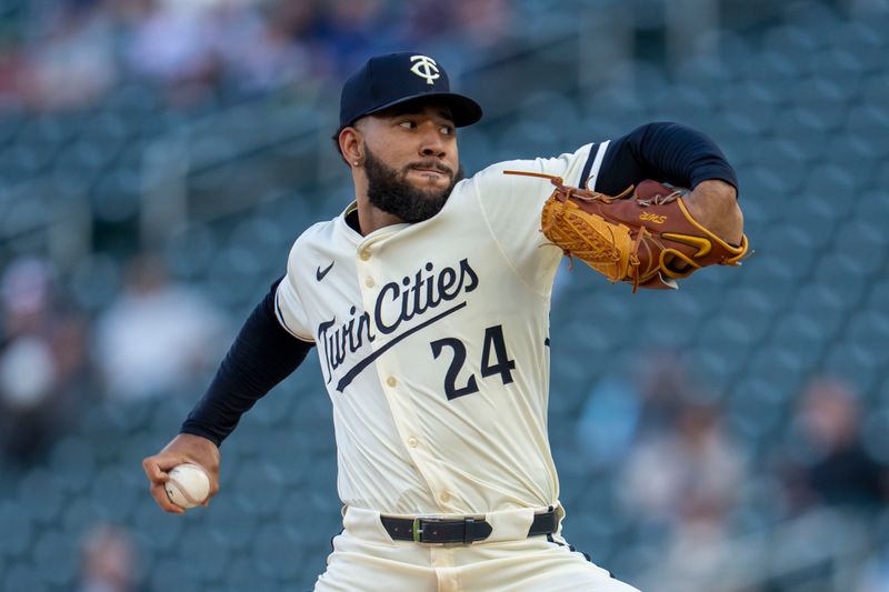 May 7, 2025; Minneapolis, Minnesota, USA; Minnesota Twins starting pitcher Simeon Woods Richardson (24) delivers a pitch against the Baltimore Orioles in the first inning at Target Field. Mandatory Credit: Jesse Johnson-Imagn Images