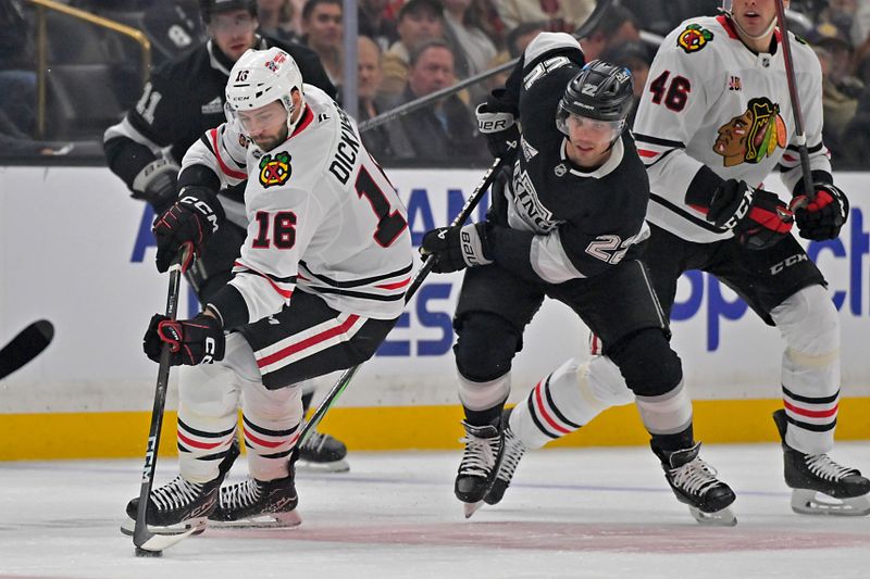 Dec 4, 2025; Los Angeles, California, USA;  Chicago Blackhawks center Jason Dickinson (16) and Los Angeles Kings left wing Kevin Fiala (22) chase down the puck during the first period at Crypto.com Arena. Mandatory Credit: Jayne Kamin-Oncea-Imagn Imagesd