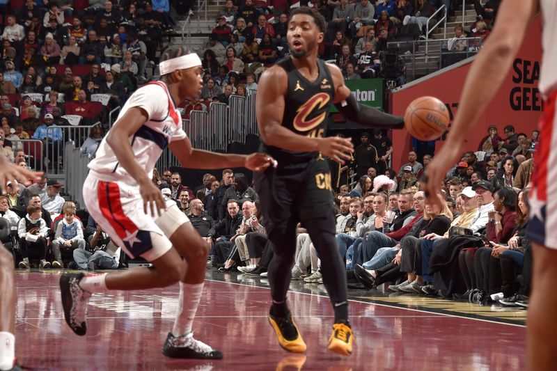 CLEVELAND, OH - NOVEMBER 03: Donovan Mitchell #45 of the Cleveland Cavaliers handles the ball during the game against the Washington Wizards during the Emirates NBA Cup game on November 03, 2024 at Rocket Mortgage FieldHouse in Cleveland, Ohio. NOTE TO USER: User expressly acknowledges and agrees that, by downloading and/or using this Photograph, user is consenting to the terms and conditions of the Getty Images License Agreement. Mandatory Copyright Notice: Copyright 2024 NBAE (Photo by David Liam Kyle/NBAE via Getty Images)