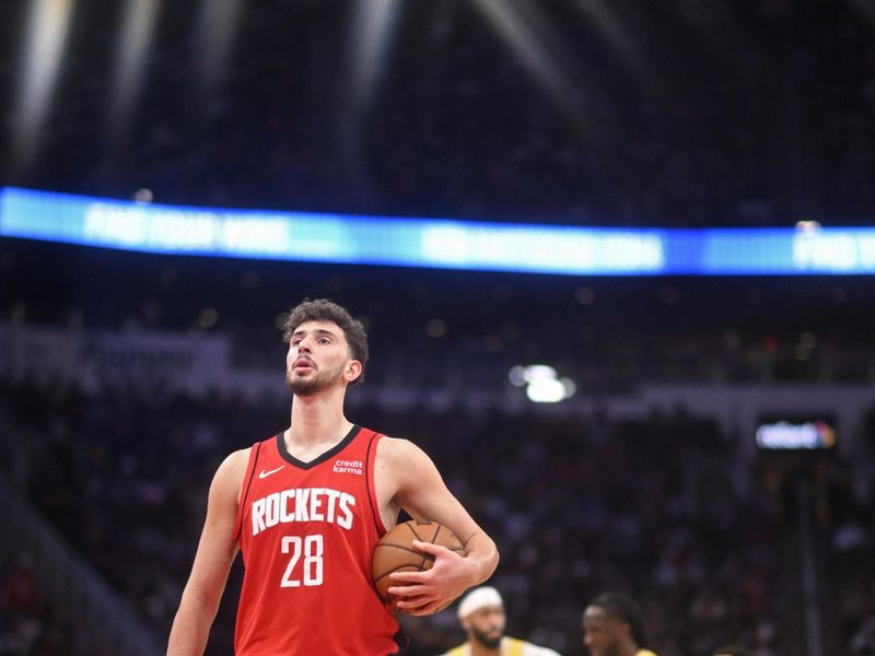 HOUSTON, TX - JANUARY 29: Alperen Sengun #28 of the Houston Rockets shoots a free throw during the game against the Los Angeles Lakers  on January 29, 2024 at the Toyota Center in Houston, Texas. NOTE TO USER: User expressly acknowledges and agrees that, by downloading and or using this photograph, User is consenting to the terms and conditions of the Getty Images License Agreement. Mandatory Copyright Notice: Copyright 2024 NBAE (Photo by Logan Riely/NBAE via Getty Images)