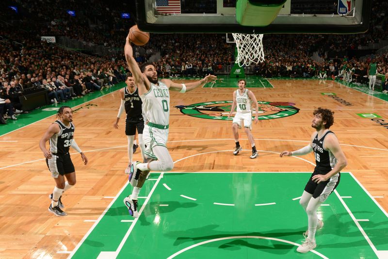 BOSTON, MA - JANUARY 17: Jayson Tatum #0 of the Boston Celtics dunks the ball during the game against the San Antonio Spurs on January 17, 2024 at the TD Garden in Boston, Massachusetts. NOTE TO USER: User expressly acknowledges and agrees that, by downloading and or using this photograph, User is consenting to the terms and conditions of the Getty Images License Agreement. Mandatory Copyright Notice: Copyright 2024 NBAE  (Photo by Brian Babineau/NBAE via Getty Images)