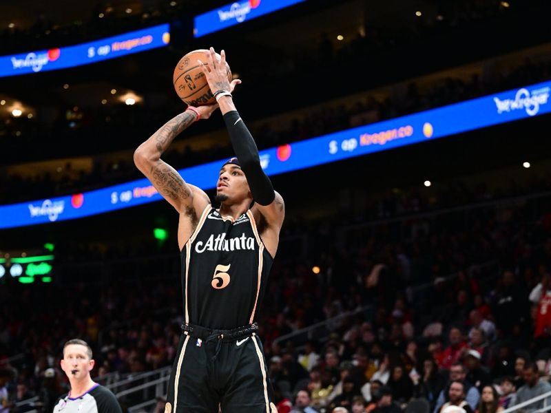 ATLANTA, GA - JANUARY 28: Dejounte Murray #5 of the Atlanta Hawks shoots the ball  during the game on January 28, 2023 at State Farm Arena in Atlanta, Georgia.  NOTE TO USER: User expressly acknowledges and agrees that, by downloading and/or using this Photograph, user is consenting to the terms and conditions of the Getty Images License Agreement. Mandatory Copyright Notice: Copyright 2023 NBAE (Photo by Adam Hagy/NBAE via Getty Images)