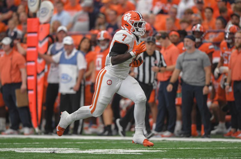 Sep 30, 2023; Syracuse, New York, USA; Clemson running back Phil Mafah (7) runs for a touchdown against Syracuse during the fourth quarterr at JMA Wireless Dome. Mandatory Credit: Ken Ruinard-USA TODAY Sports