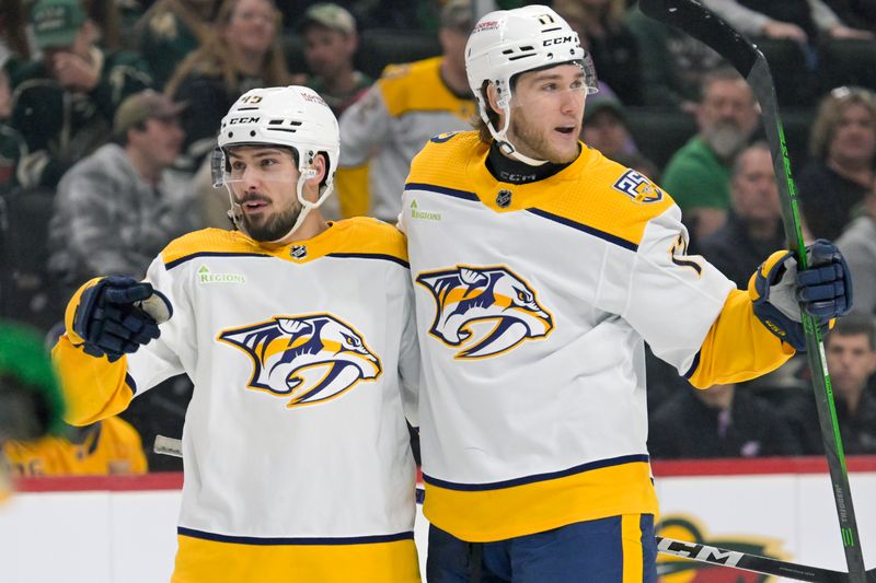 Mar 10, 2024; Saint Paul, Minnesota, USA;  Nashville Predators forward Mark Jankowski (17) celebrates his goal against the Minnesota Wild with defenseman Alexandre Carrier (45) during the first period at Xcel Energy Center. Mandatory Credit: Nick Wosika-USA TODAY Sports
