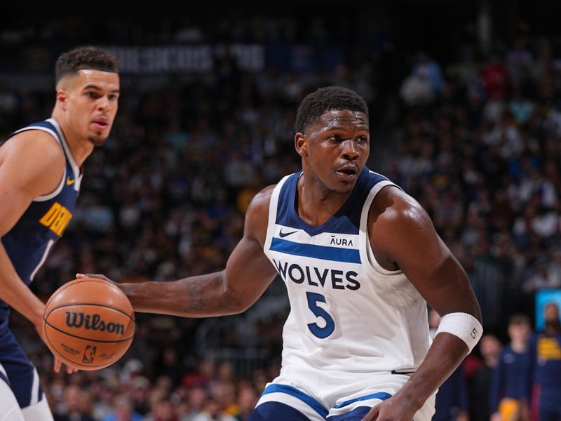 DENVER, CO - APRIL 10: Anthony Edwards #5 of the Minnesota Timberwolves dribbles the ball during the game against the Denver Nuggets on April 10, 2024 at the Ball Arena in Denver, Colorado. NOTE TO USER: User expressly acknowledges and agrees that, by downloading and/or using this Photograph, user is consenting to the terms and conditions of the Getty Images License Agreement. Mandatory Copyright Notice: Copyright 2024 NBAE (Photo by Bart Young/NBAE via Getty Images)