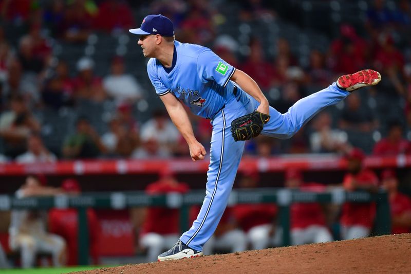 Aug 13, 2024; Anaheim, California, USA; Toronto Blue Jays pitcher Erik Swanson (50) throws against the Los Angeles Angels during the ninth inning at Angel Stadium. Mandatory Credit: Gary A. Vasquez-USA TODAY Sports