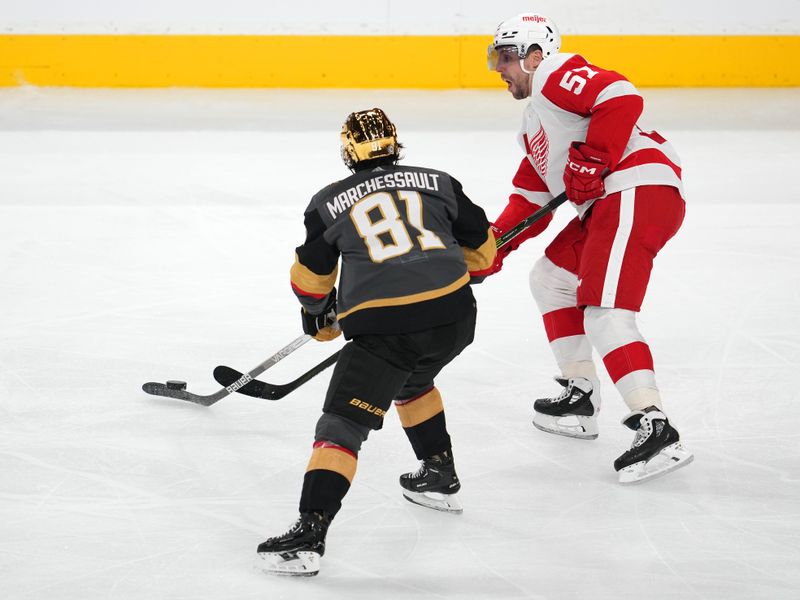 Jan 19, 2023; Las Vegas, Nevada, USA; Detroit Red Wings left wing David Perron (57) shoots over the stick of Vegas Golden Knights center Jonathan Marchessault (81) during the third period at T-Mobile Arena. Mandatory Credit: Stephen R. Sylvanie-USA TODAY Sports