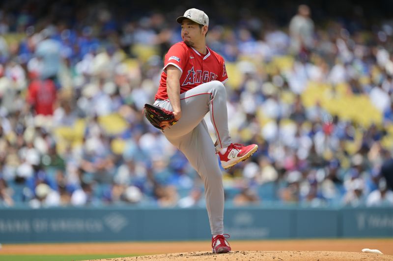 May 18, 2025; Los Angeles, California, USA; Los Angeles Angels pitcher Yusei Kikuchi (16) pitches in the first inning against the Los Angeles Dodgers at Dodger Stadium. Mandatory Credit: Jayne Kamin-Oncea-Imagn Images