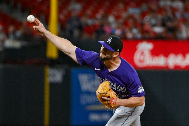 Jun 6, 2024; St. Louis, Missouri, USA; Colorado Rockies relief pitcher Matt Carasiti (29) pitches against the St. Louis Cardinals during the sixth inning at Busch Stadium. Mandatory Credit: Jeff Curry-USA TODAY Sports