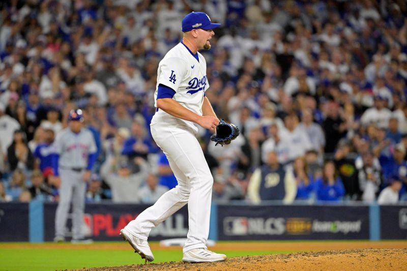 Oct 20, 2024; Los Angeles, California, USA; Los Angeles Dodgers pitcher Blake Treinen (49) reacts in the eighth inning against the New York Mets during game six of the NLCS for the 2024 MLB playoffs at Dodger Stadium. Mandatory Credit: Jayne Kamin-Oncea-Imagn Images