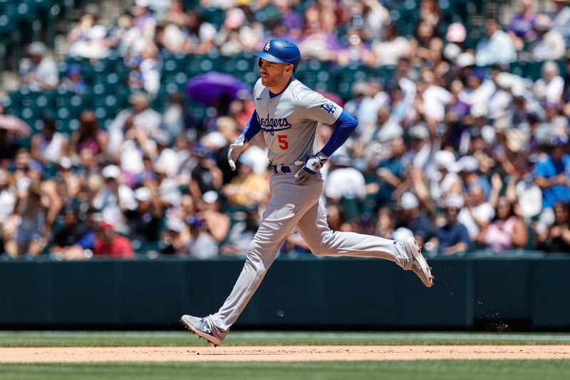 Jun 20, 2024; Denver, Colorado, USA; Los Angeles Dodgers first baseman Freddie Freeman (5) rounds the bases on a solo home run in the fourth inning against the Colorado Rockies at Coors Field. Mandatory Credit: Isaiah J. Downing-USA TODAY Sports