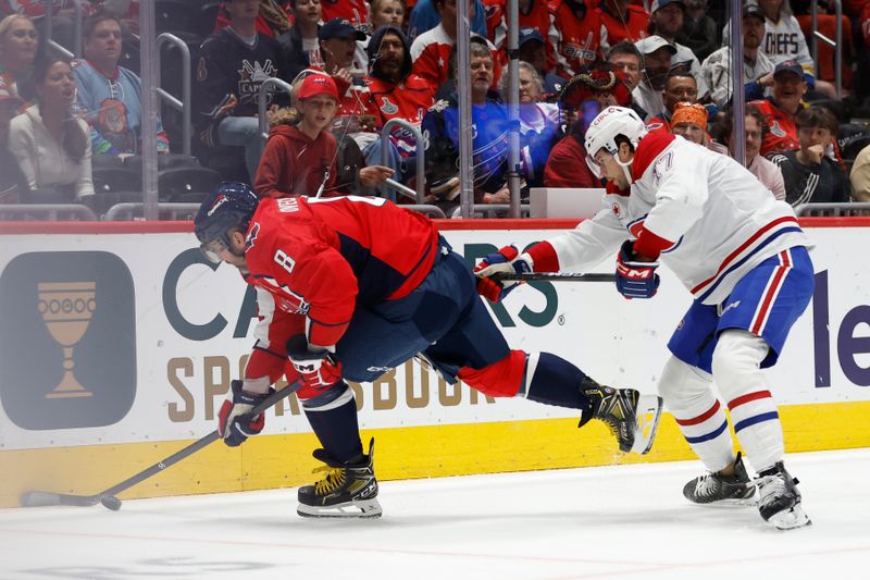 Oct 31, 2024; Washington, District of Columbia, USA; Washington Capitals left wing Alex Ovechkin (8) controls the puck while being checked from behind by Montreal Canadiens right wing Josh Anderson (17) in the first period at Capital One Arena. Mandatory Credit: Geoff Burke-Imagn Images