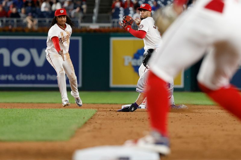 Aug 20, 2024; Washington, District of Columbia, USA; Washington Nationals second baseman Luis García Jr. (2) prepares to turn double play on a ground ball by Colorado Rockies outfielder Brenton Doyle (not pictured) to end the ninth inning at Nationals Park. Mandatory Credit: Geoff Burke-USA TODAY Sports