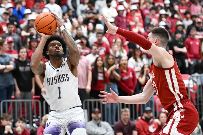 Mar 7, 2024; Pullman, Washington, USA; Washington Huskies forward Keion Brooks Jr. (1) shoots the ball against Washington State Cougars forward Andrej Jakimovski (23) in the first half at Friel Court at Beasley Coliseum. Mandatory Credit: James Snook-USA TODAY Sports