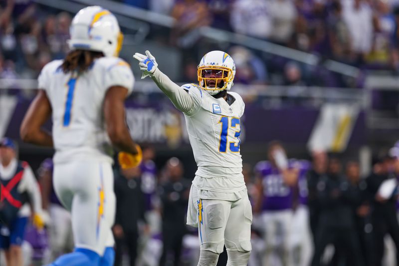 Los Angeles Chargers wide receiver Keenan Allen (13) reacts after a play against the Minnesota Vikings during the second half of an NFL football game Sunday, Sept. 24, 2023 in Minneapolis. (AP Photo/Stacy Bengs)